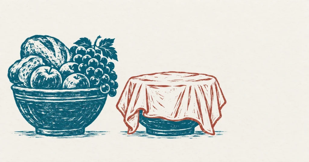 Two identical earthenware bowls side by side printed in teal, the left one heaped with bread and fruit and the right one empty, with a cloth drawn over the empty one in red in a later hand